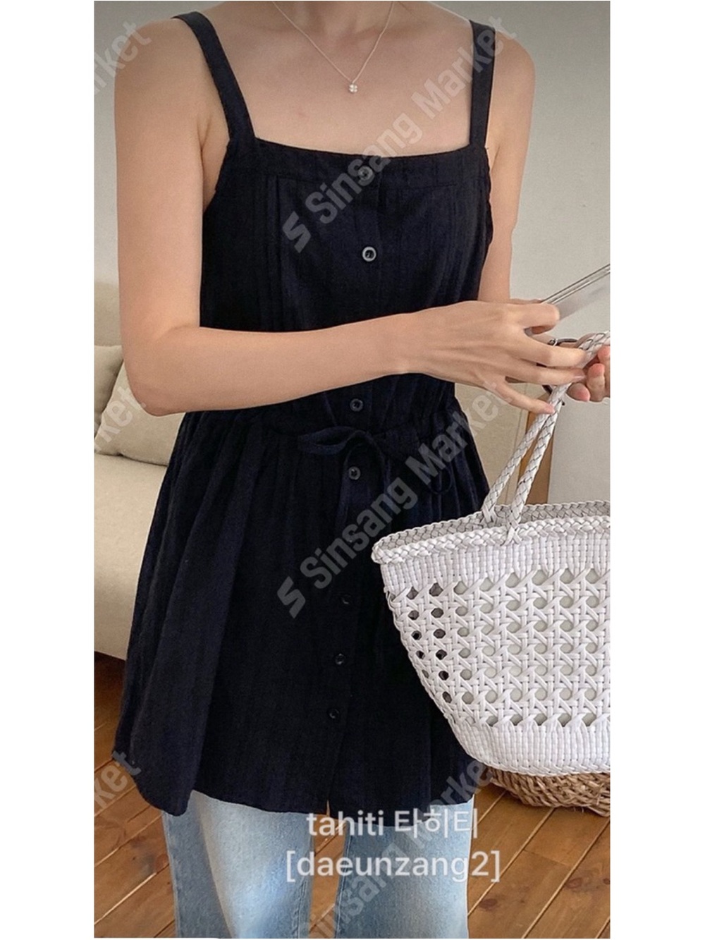 Korean black mini dress with button front
Sleeveless